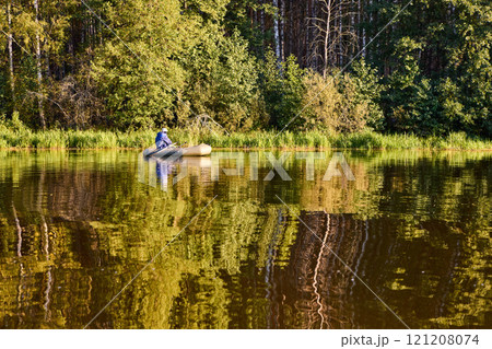 Fishing in a Boat on Calm Forest Lake 121208074