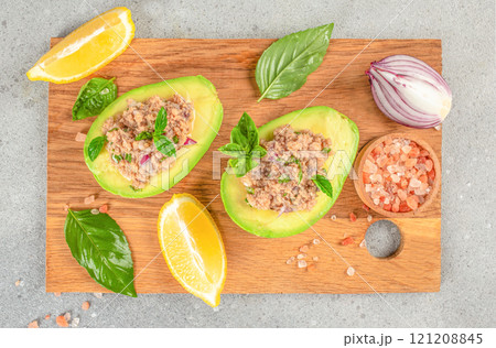 Tuna stuffed avocado. healthy and balanced eating. top view 121208845