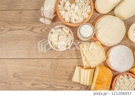 Different lactose free products on a wooden board, top view. copy space Different lactose free products on a wooden board, top view. copy space 121208857