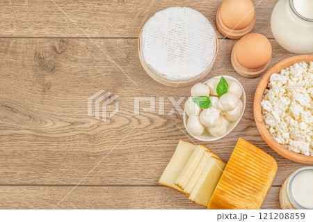 lactose-free milk with ingredients on wooden background. top view. copy space lactose-free milk with ingredients on wooden background. top view. copy space 121208859