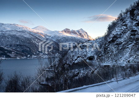 Winter landscape with a fjord and mountains,, Norway 121209047
