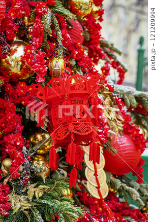Red lantern and vivid decorations create vibrant celebration of Chinese culture, festive season. 121209994