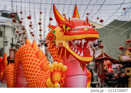 A vibrant inflatable dragon decoration in traditional Chinese festival celebration 121210007