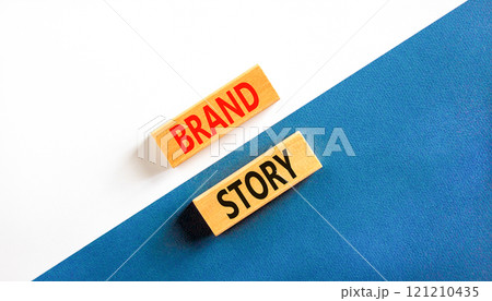 Brand story branding symbol. Concept words Brand story on beautiful wooden blocks. Beautiful white and blue background. Business brand story branding concept. Copy space. Brand story branding symbol. Concept words Brand story on beautiful wooden blocks. Beautiful white and blue background. Business brand story branding concept. Copy space. 121210435
