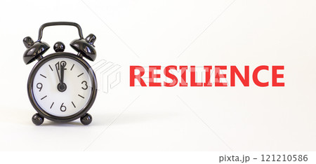 Resilience symbol. Concept word Resilience on beautiful white paper. Beautiful white paper background. Black alarm clock. Business resilience concept. Copy space. 121210586