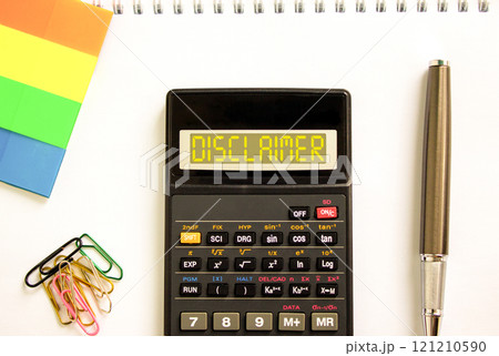 Disclaimer symbol. Concept word Disclaimer on beautiful black calculator. Beautiful white paper background. Beautiful black pen. Colored paper. Business disclaimer concept. Copy space. 121210590