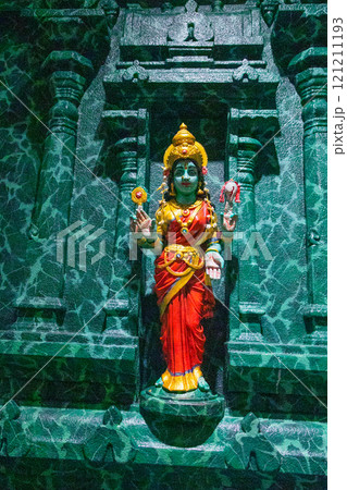 traditional small buddhist temple in kuala lumpur with many figures on facade traditional small buddhist temple in kuala lumpur with many figures on facade 121211193