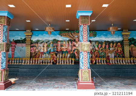 traditional small buddhist temple in kuala lumpur with many figures on facade traditional small buddhist temple in kuala lumpur with many figures on facade 121211194