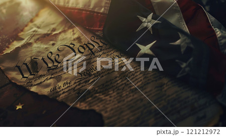 A detailed view of the U.S. Constitution adorned with the American flag, celebrating USA Constitution Day and depicting the spirit of democracy 121212972