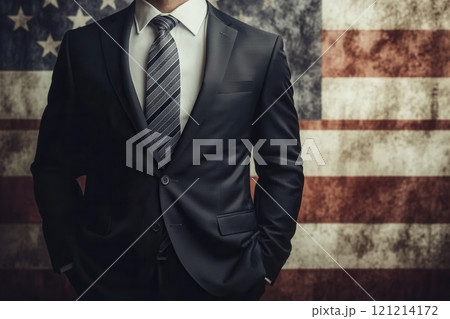 Businessman standing with hands in pockets in front of american flag Businessman standing with hands in pockets in front of american flag 121214172