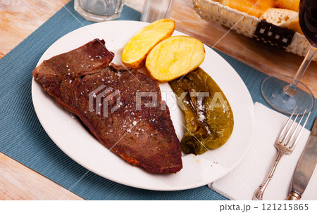 Grilled beef steak with potatoes and jalapenos peppers Grilled beef steak with potatoes and jalapenos peppers 121215865