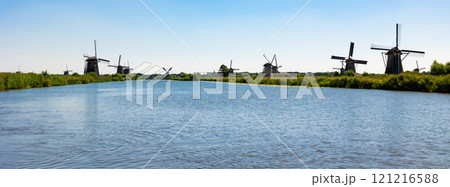 Summer landscape with a view of windmills in Kinderdijk 121216588