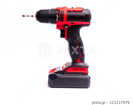a powerless screwdriver with a screw bit on a white background. isolated 121217976
