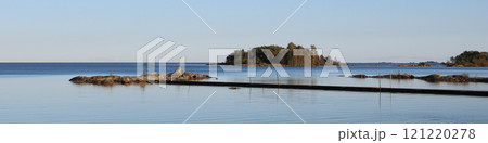 View from Vita Sannar, Sweden. Rock formation and small island, Lake Vanern. 121220278