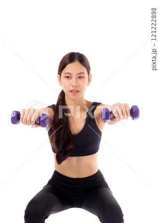 Young Woman Exercising with Dumbbells in Black Sportswear on White Background Young Woman Exercising with Dumbbells in Black Sportswear on White Background 121222898