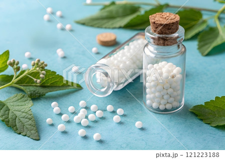Homeopathy ingredients arranged on a blue...のイラスト素材 [121223188] - PIXTA