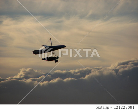 Hang Glider Soaring Through the Clouds. High quality photo 121225091