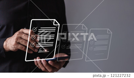 Young man with smartphone mobile hand using a pen touching to sign a Online Business Contract Young man with smartphone mobile hand using a pen touching to sign a Online Business Contract 121227232