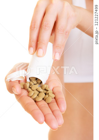 Human hands holding vitamins pills. Health care. 121227499
