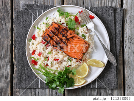 grilled red salmon fillet with rice, top view grilled red salmon fillet with rice, top view 121228095