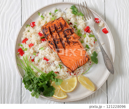 grilled red salmon fillet with rice, top view grilled red salmon fillet with rice, top view 121228096