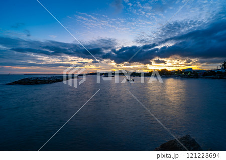 Beautiful clouds in sunset or sunrise over sea,Colorful scenery sunset sky, Amazing clouds wonderful light sky background 121228694