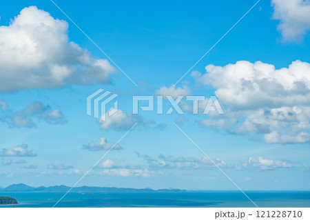 Beautiful clouds in sunny sky over sea nature background 121228710