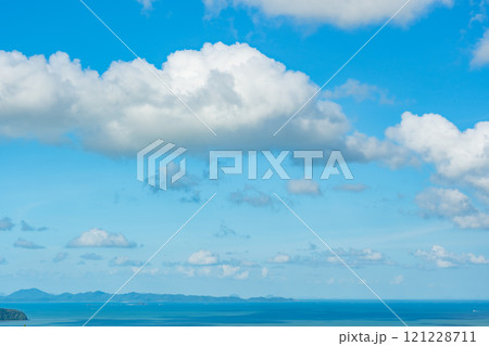 Beautiful clouds in sunny sky over sea nature background Beautiful clouds in sunny sky over sea nature background 121228711