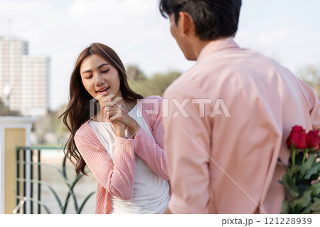 Romantic valentine's surprise for lovers urban rooftop lifestyle photo bright day close-up love story 121228939