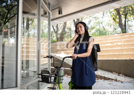 Promoting clean energy through bicycles reducing pollution in urban environments lifestyle imagery outdoor setting Promoting clean energy through bicycles reducing pollution in urban environments lifestyle imagery outdoor setting 121228941