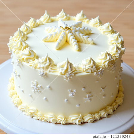 ゴールドベルで飾られたシンプルでエレガントなケーキ ゴールドベルで飾られたシンプルでエレガントなケーキ 121229248