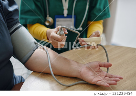 Senior Woman Having Meeting With Nurse Senior Woman Having Meeting With Nurse 121229454