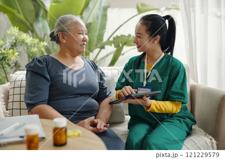Social Worker Visiting To Patient At Home 121229579