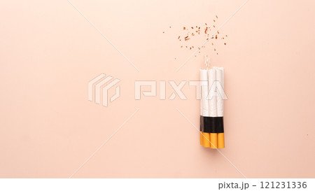 Cigarette like time bomb on brown background. Tobacco smoking is cause of preventable illness and death. World no tobacco day concept template. 121231336