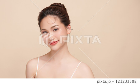 Beautiful young asian woman with clean fresh skin on beige background, Face care, Facial treatment, Cosmetology, beauty and spa, Asian women portrait. 121233588