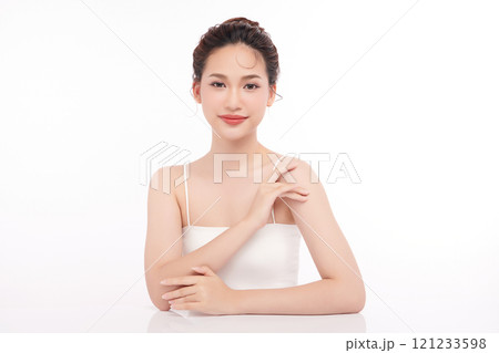 Beautiful young asian woman with clean fresh skin on white background, Face care, Facial treatment, Cosmetology, beauty and spa, Asian women portrait. Beautiful young asian woman with clean fresh skin on white background, Face care, Facial treatment, Cosmetology, beauty and spa, Asian women portrait. 121233598