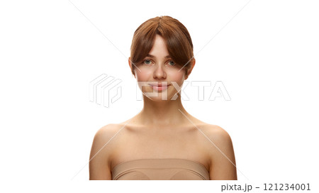 Portrait of beautiful young woman with well-kept skin, clear spotless face, posing against white studio background Portrait of beautiful young woman with well-kept skin, clear spotless face, posing against white studio background 121234001