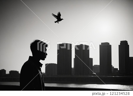 male silhouette against skyscrapers 121234528