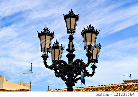 Beautiful classic ornate lamppost of the streets of Mijas, Malaga Beautiful classic ornate lamppost of the streets of Mijas, Malaga 121235564