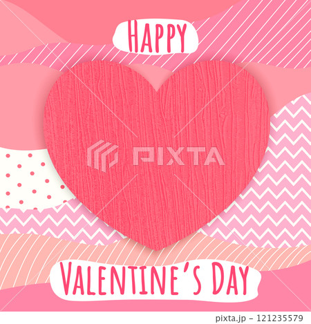Happy Valentines Day greeting card with textile textured heart shape on patchwork fabric background. Creative Valentines concept 121235579