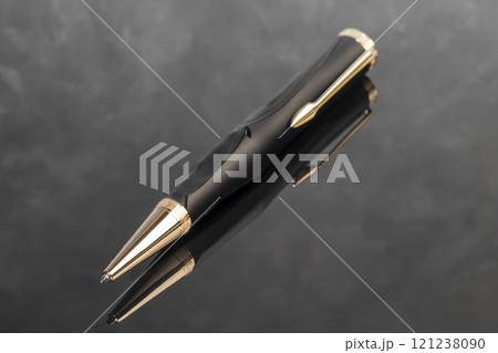 Fountain pen on marble and grey background. Selective focus. Office interior Fountain pen on marble and grey background. Selective focus. Office interior 121238090