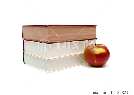 books and ripe apple on a white background books and ripe apple on a white background 121238299