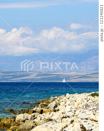 Traditional Croatia nature landscape, Adriatic sea, rocky coast, mountains, blue sky, white sail 121240821