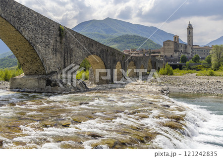 Gobbo Bridge also Devil Bridge or Ponte del Diavolo or Ponte Gobbo in Bobbio, Piacenza province, Trebbia Valley, Emilia Romagna, Italy 121242835