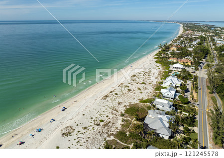 Large residential homes in island small town Boca Grande on Gasparilla Island in southwest Florida. American waterfront houses in rural US suburbs Large residential homes in island small town Boca Grande on Gasparilla Island in southwest Florida. American waterfront houses in rural US suburbs 121245578