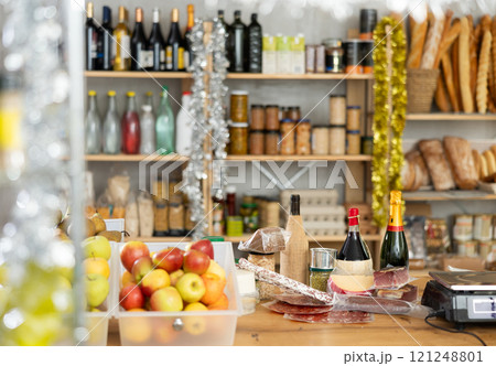 Different products on counter of grocery store Different products on counter of grocery store 121248801