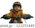 A young boy is wearing a helmet while riding a bike 121251449