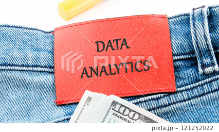 The concept of technology and development. Phrase, words, text DATA ANALYTICS on the leather label of jeans The concept of technology and development. Phrase, words, text DATA ANALYTICS on the leather label of jeans 121252022