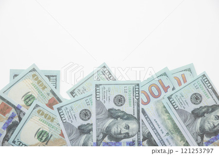 close up fiat money 100 usd banknotes on a white background. Pile of United States of America Finance. concepts of banking,cash, savings,fiat money concept,100 dollars. Money Mockup. 121253797