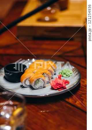 Philadelphia rolls on a plate in a restaurant 121254936
